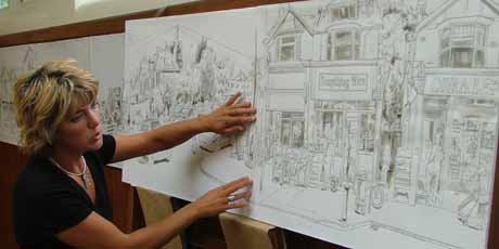 Ann adds the final touches to her exhibition